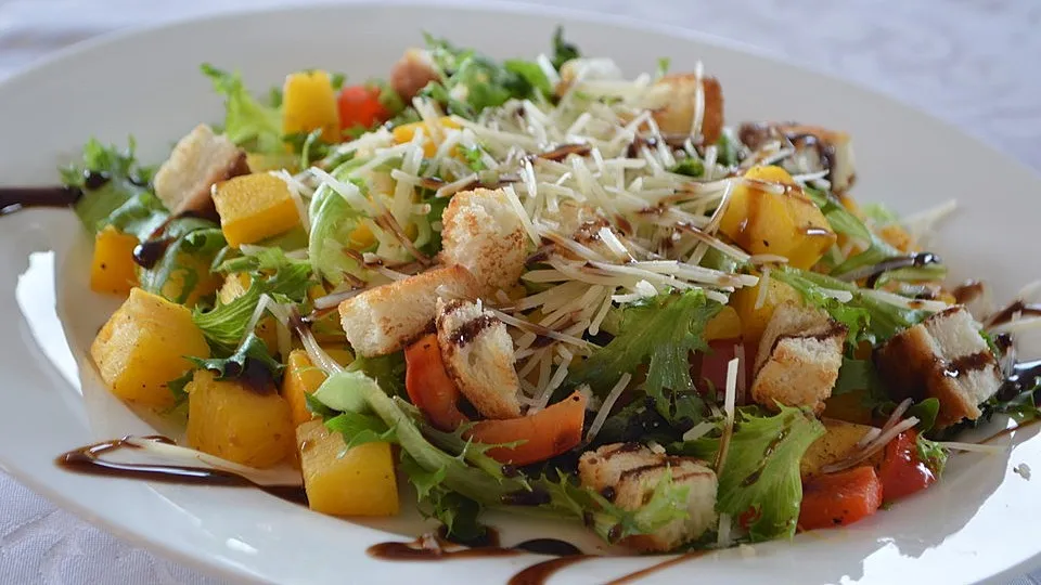 Gebratener Kürbis mit Rucola und Parmesan